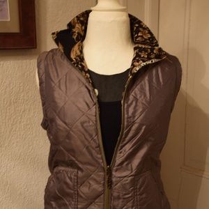 Tan vest, gold and black lined.